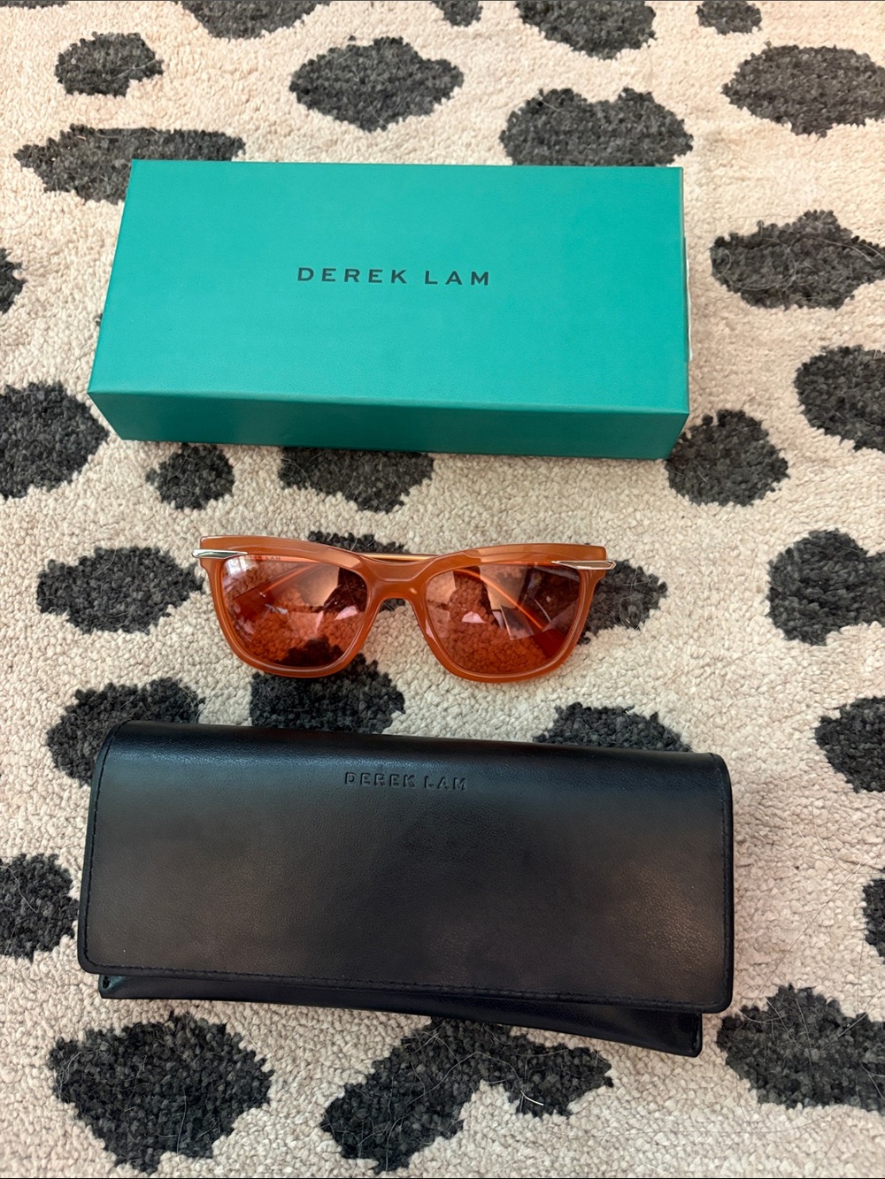Derek Lam Amber Orange Sunglasses with Black Case